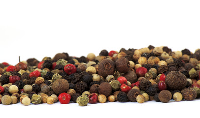 close up of several types of peppercorns
