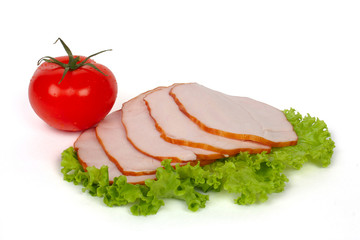 Slices of ham and one tomato