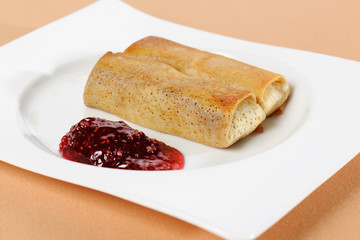 Pancakes with cottage cheese inside and berry jam