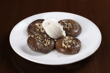 Fig dessert in White Plate on Dark Background
