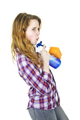 Young woman with cleaning supplies