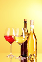 White wine on yellow background