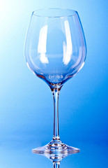 empty wine glasses on blue background