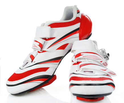 Pair road cycling shoes on white background.