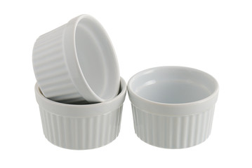Three white ceramic individual baking pans