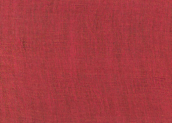 Fond tissé rouge .