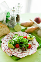 Carpaccio di Piovra con insalata