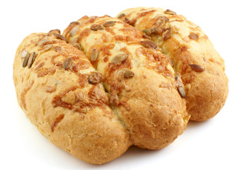 Loaf of fresh corn bread with pumpkin seeds