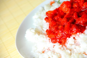 Tasty dish made from fresh crushed strawberries and rice