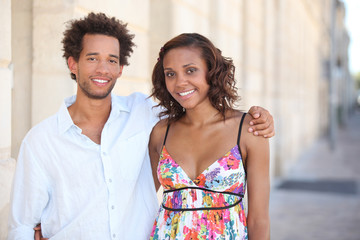 Young couple walking in the street