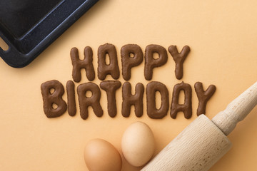 Letter biscuits spelling the words HAPPY BIRTHDAY