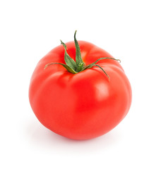 Ripe tomato isolated over white background.