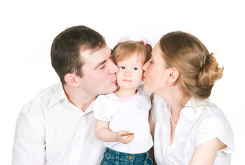 Parents kiss the daughter