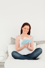 Attractive female reading a book