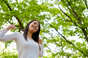 beautiful asian woman in the forest