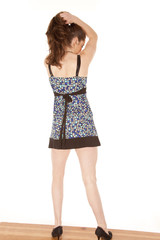 Woman standing from back