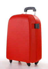 Red suitcase isolated on white