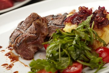 Beef steaks with vegetables