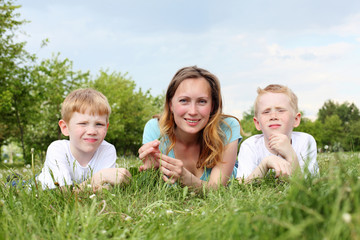 mother with her two sons outdoors