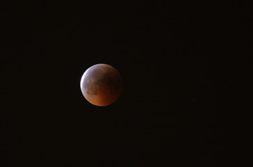 Partial lunar eclipse exiting umbra on 16 June at 00:08, Bahrain