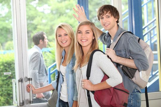 Group of students at college entrance
