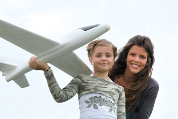 Girl with model aeroplane