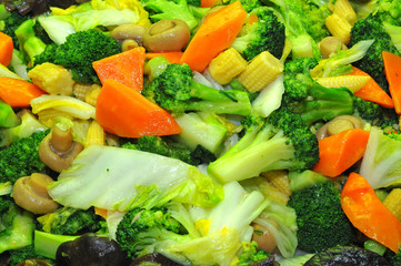 Fried Broccoli With Red Carrot And Button Mushroom