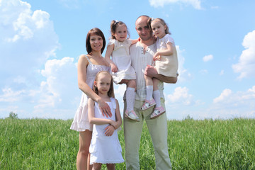 family with children in summer day outdoors