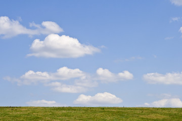 Obraz na płótnie Canvas White clouds on blue sky.