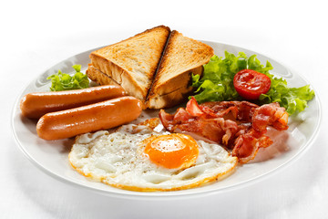 English breakfast - toast, egg, bacon and vegetables