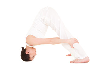 Young woman doing yoga exercise
