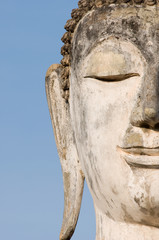 Fototapeta na wymiar ancient buddha image statue at Sukhothai historical park