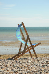 Fototapeta na wymiar Deck Chair on the Beach