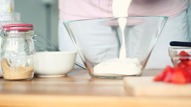 Mixing dough in bowl, slow motion