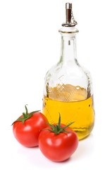 Tomatoes and olive oil isolated on the white