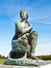 A woman Statue at Versailles castle in France