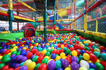 Much varicoloured bright balls are poured in sector for slide
