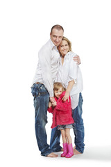 Fototapeta na wymiar Father and mother in white shirts and girl in pink