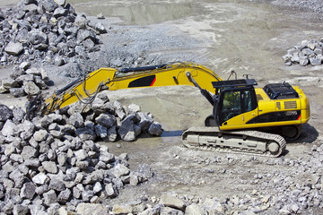 Bagger und Steine
