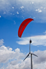 Parachute with the wind generator in blue sky