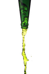 Splashing green water from bottle