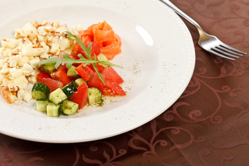 Scrambled eggs with salmon and vegetables