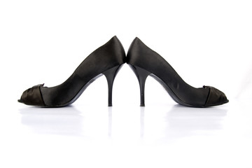 Black high heel women shoes on white background.
