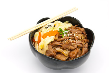 rice under fried pork and vegetable