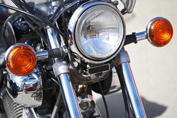 Fototapeta premium Part of motorcycle – headlight. Detail of Motorbike. Outdoors