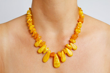 Amber jewellery on female neck