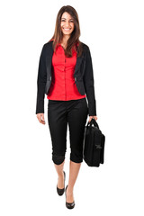 Full length businesswoman holding a briefcase