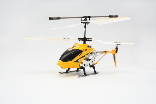 Isolated Yellow Remote Controlled Helicopter