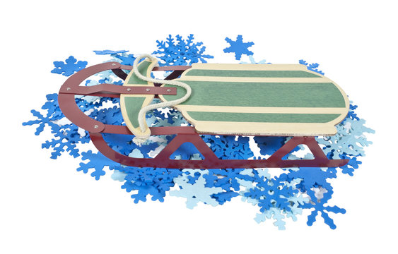 Sled on a Bed of Colorful Snowflakes