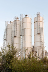 A group of processing silos of a concrete factory
